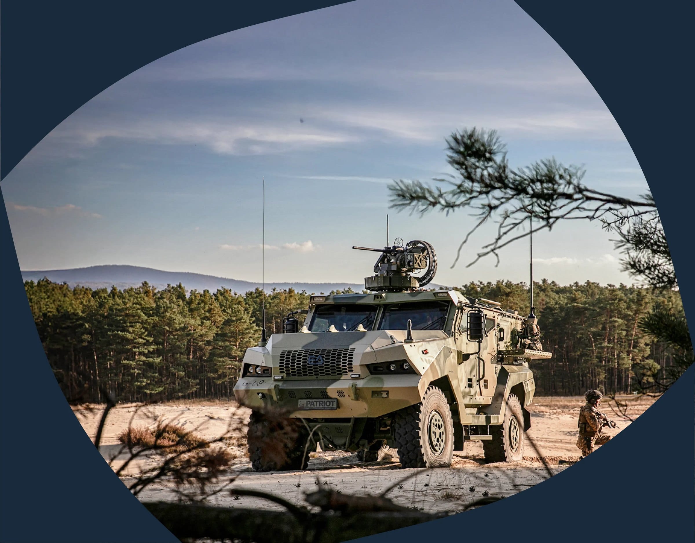 An armoured vehicle in a pine forest clearing, framed by a soft curved shape on a dark blue ground.