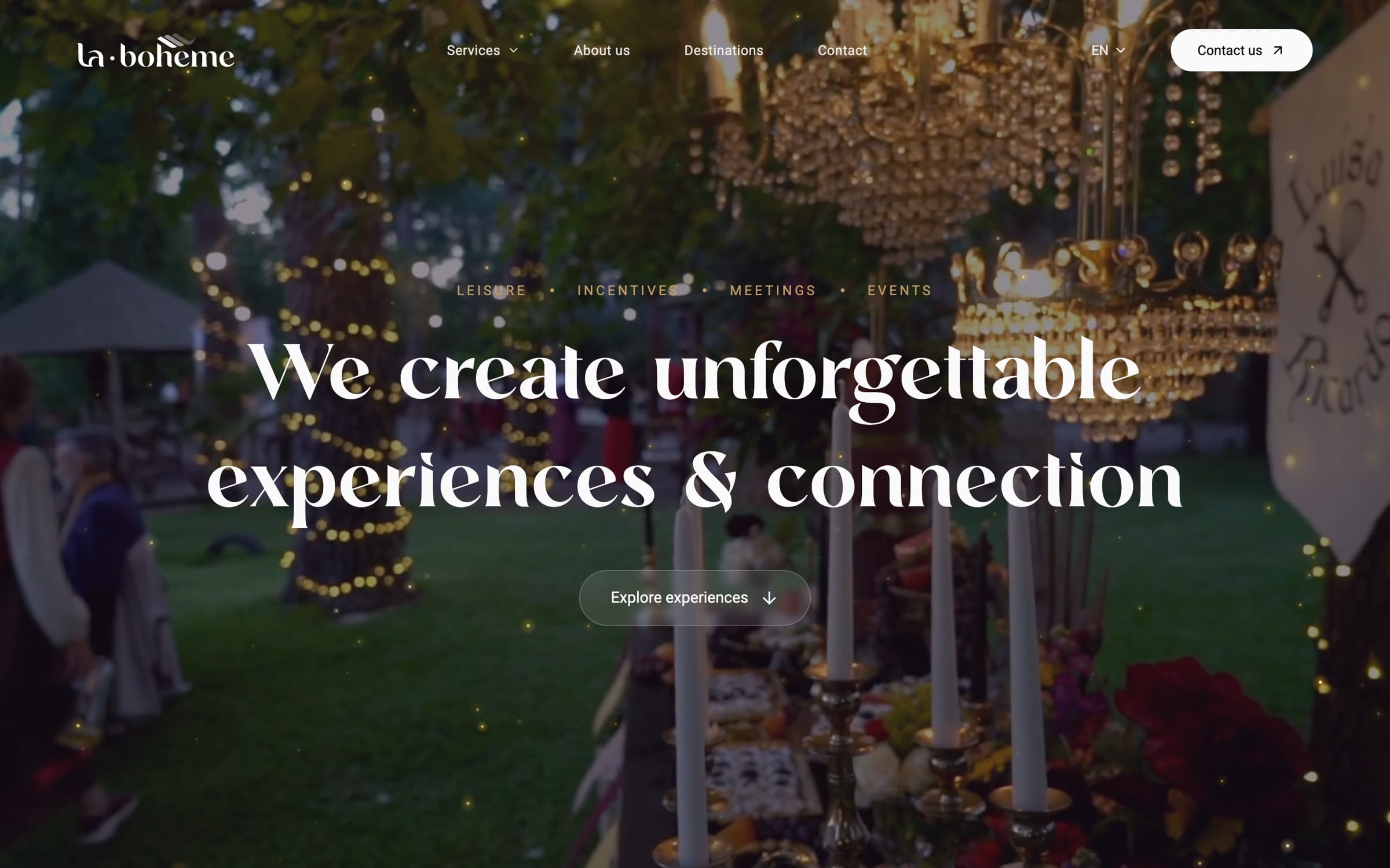 The La-Bohème website hero: “We create unforgettable experiences & connection” over footage of a candlelit garden dinner.