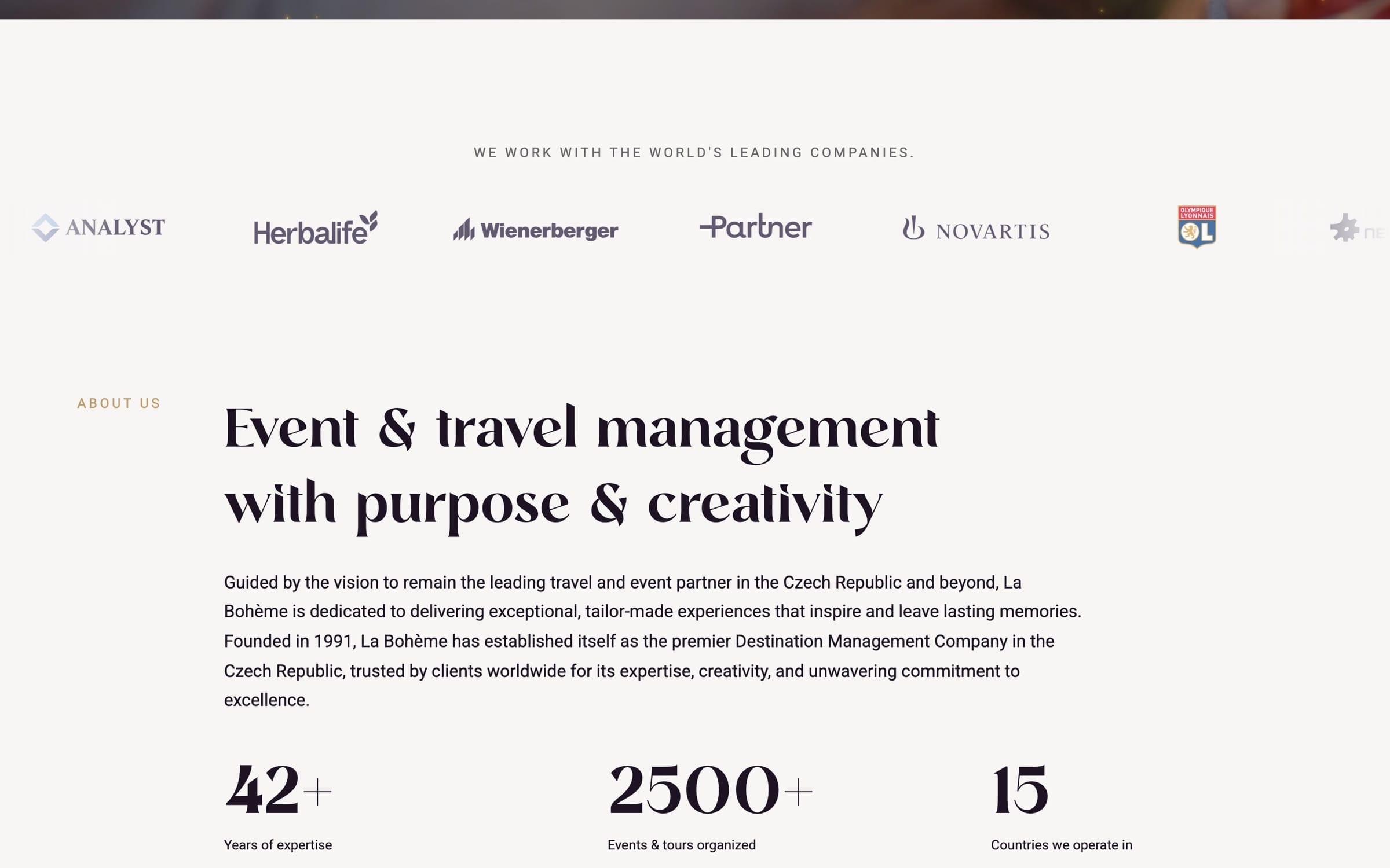“We work with the world’s leading companies” on ivory, above client logos including Herbalife, Wienerberger and Novartis.