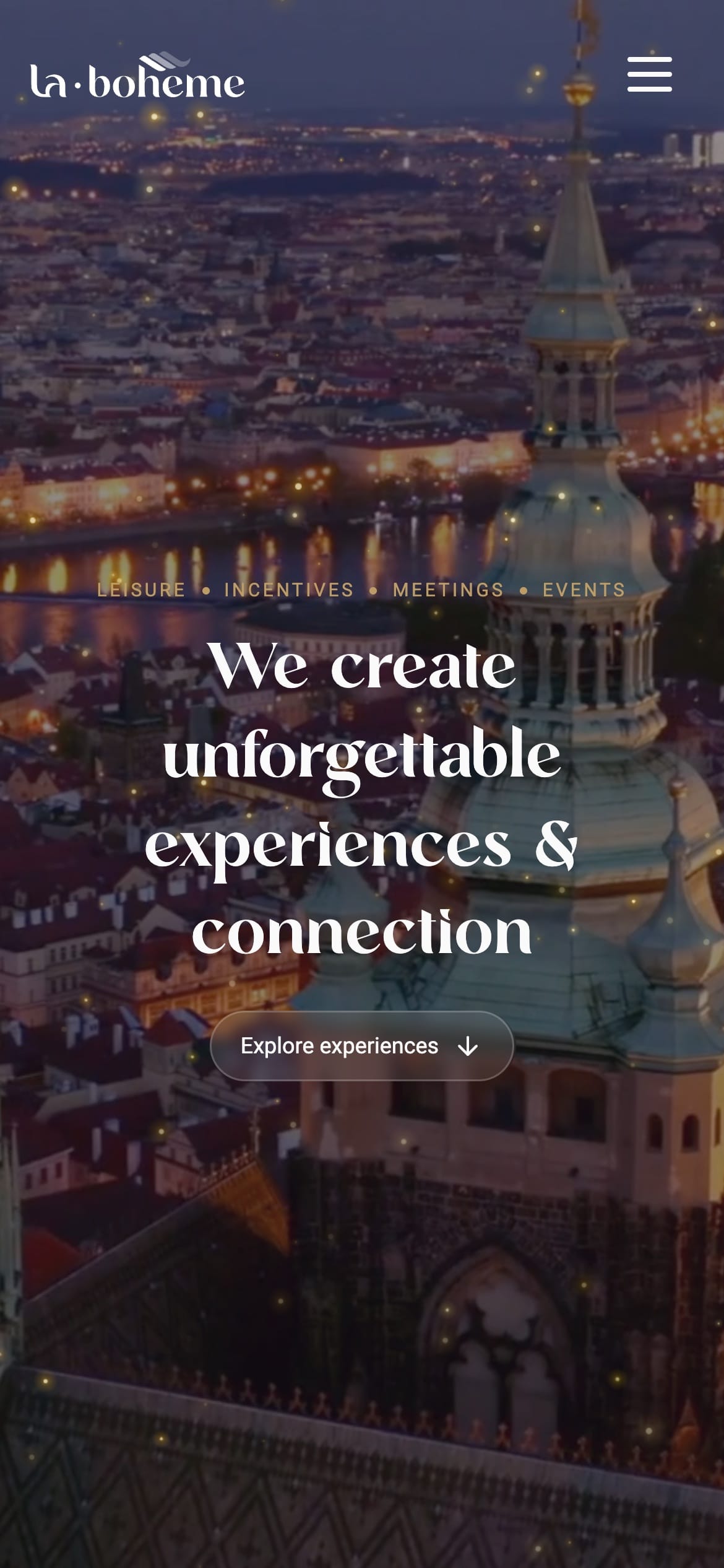 The La-Bohème hero on a phone: the serif headline over dusk footage of Prague, with an “Explore experiences” button.