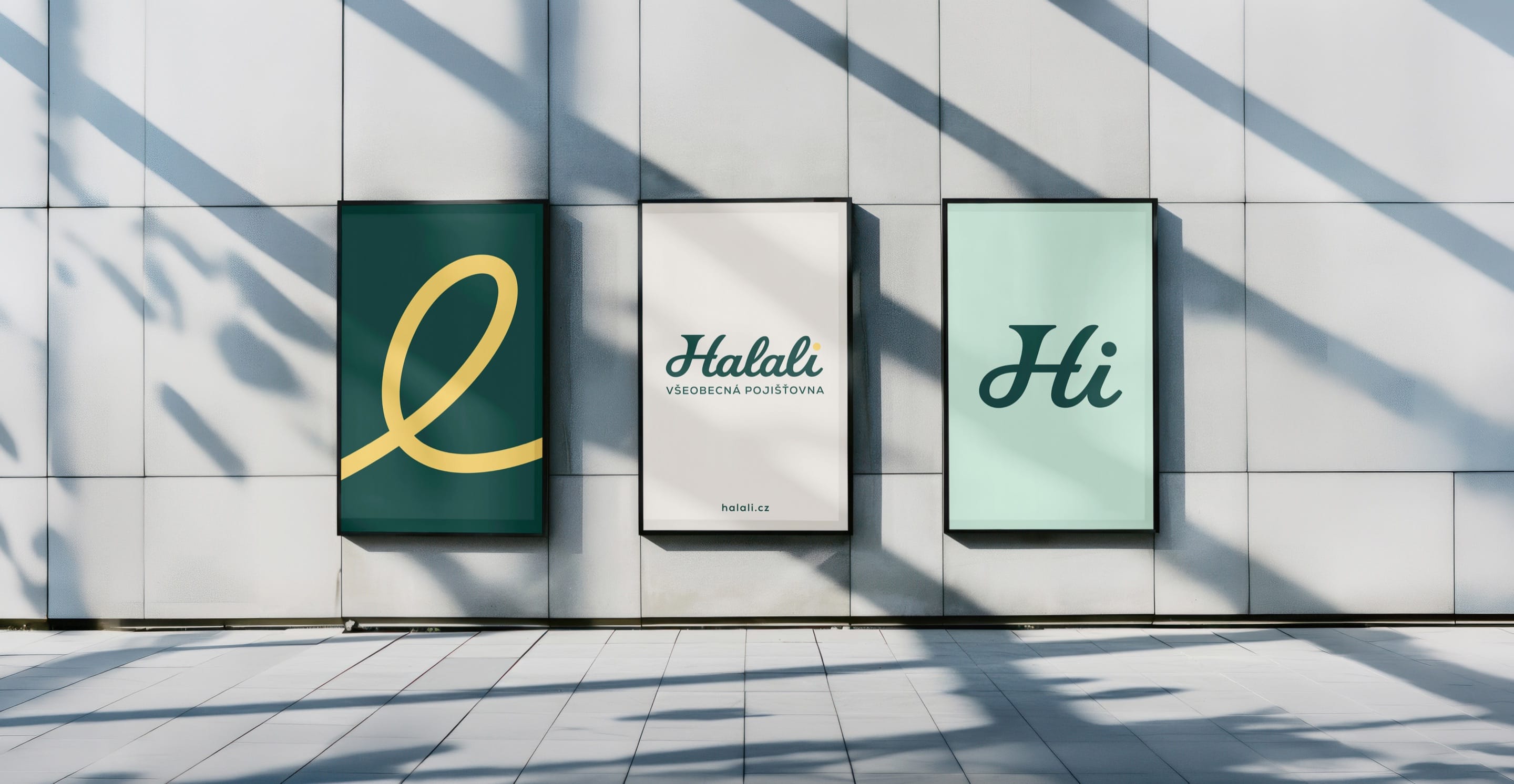 Three Halali posters on a sunlit wall: a yellow loop on Forest Teal, the logo on champagne and the Hi monogram on Light Mint.