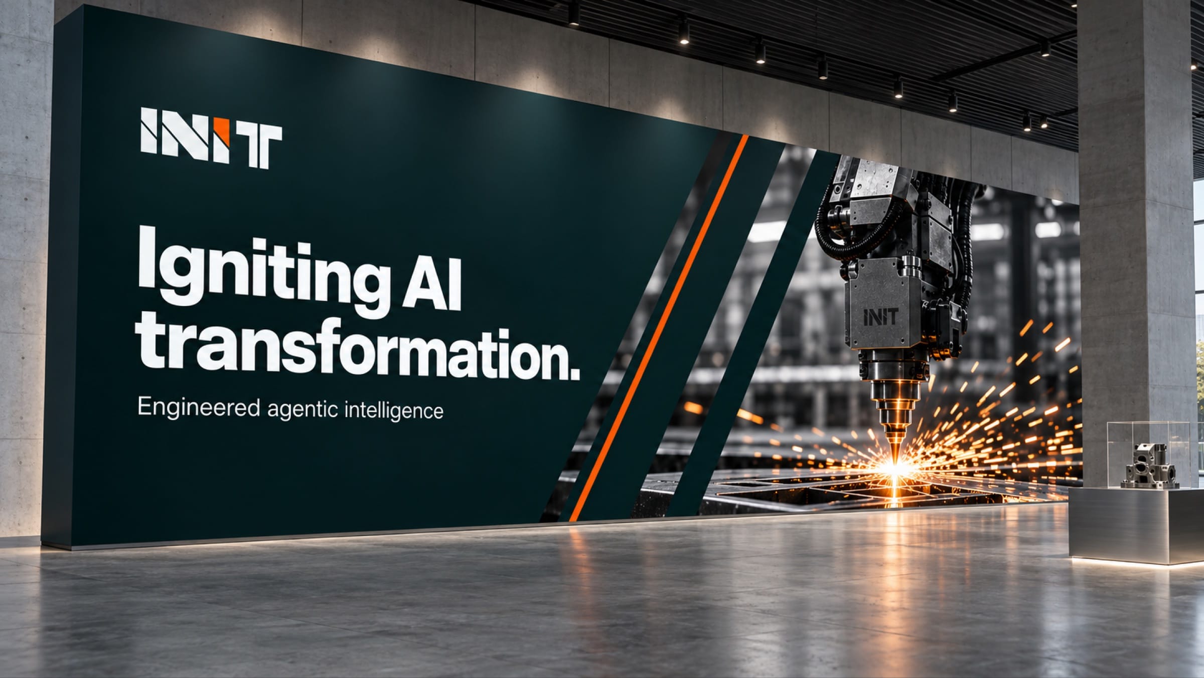 A large obsidian wall graphic in a concrete hall: Igniting AI transformation beside a machine head throwing sparks.