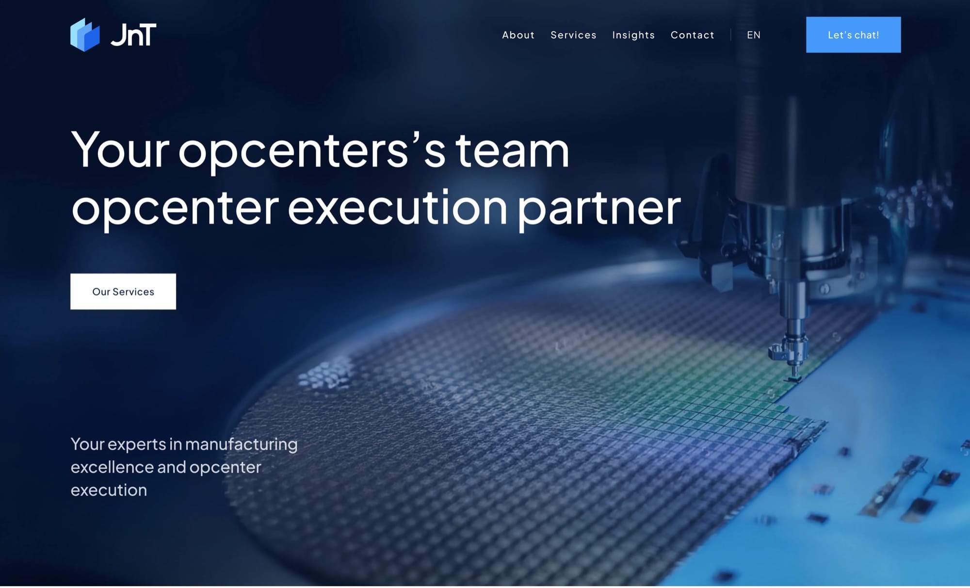 The JNT Digital homepage hero in deep blue: an opcenter execution partner headline over a machine working on a wafer.