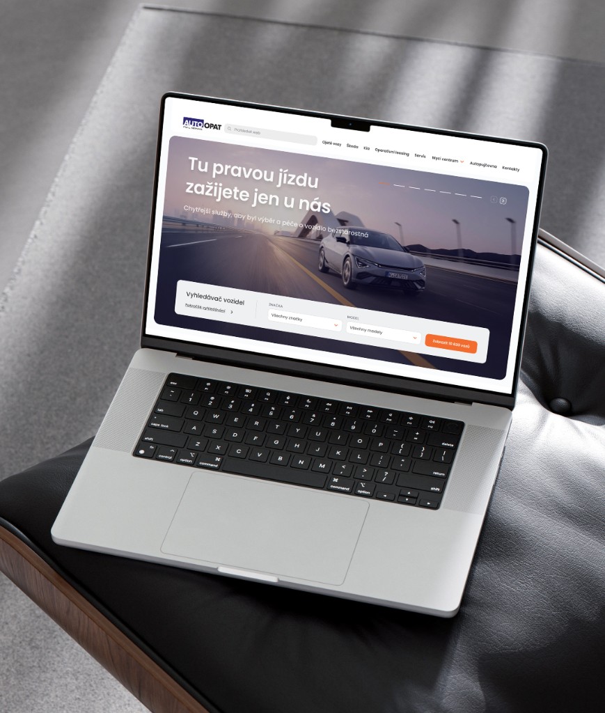AutoOpat Cars website on laptop